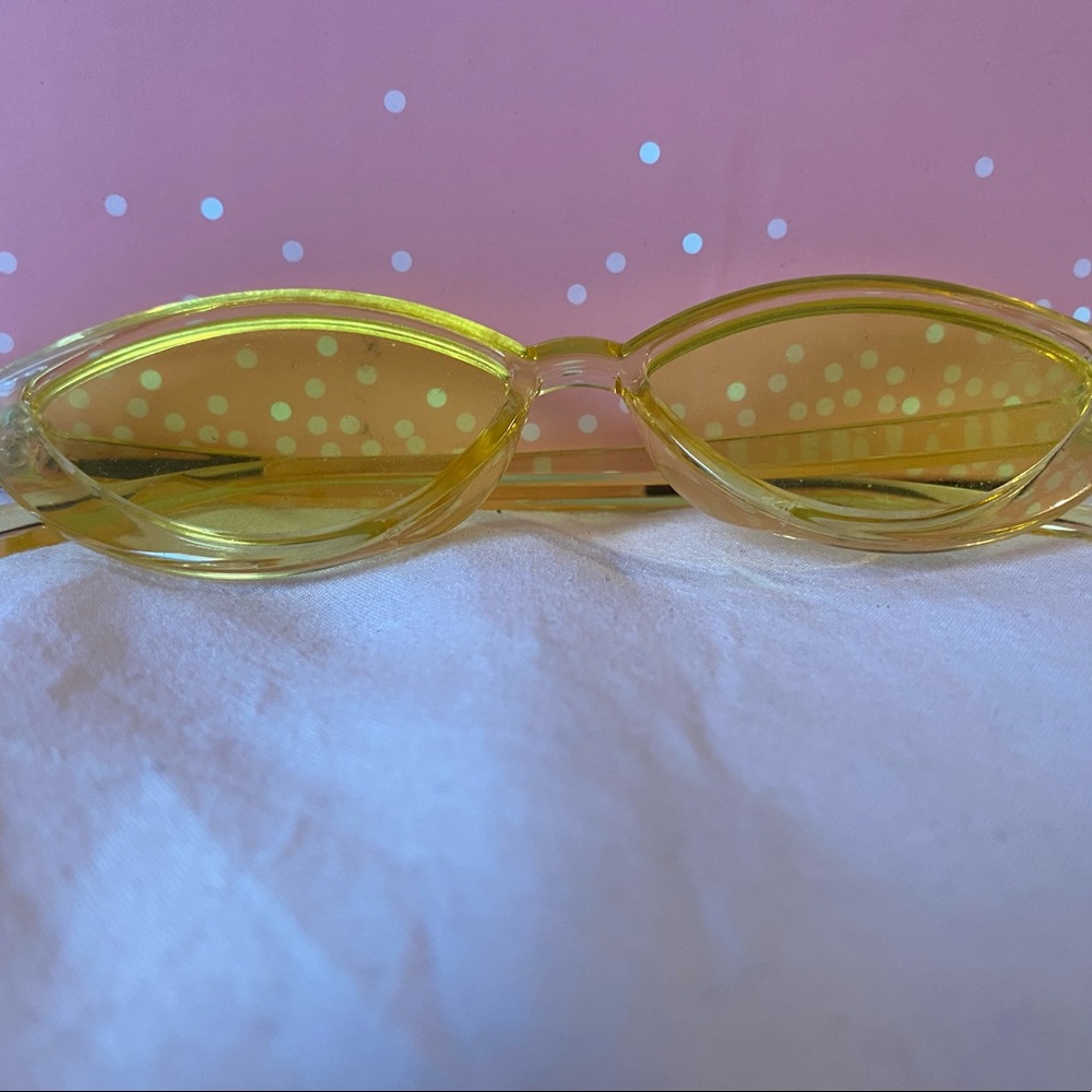 Cat-eye clear yellow framed sunglasses